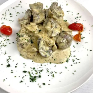 Rognons d'agneau à la crème de champignons